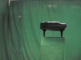 180 Degrees _ Picture 9 _ Black plastic kids small grand piano.png
